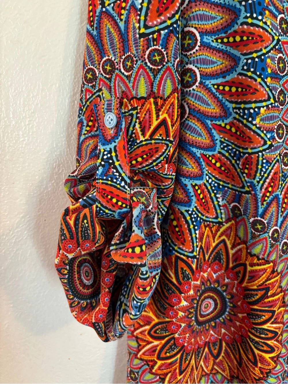 Sunburst Floral Multicolor V-Neck Tunic with Tassel Hem